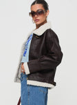Faux leather jacket Classic collar, exposed zip fastening, twin pockets, buckle detail
