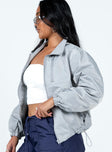Jacket High neck Zip fastening at front Twin hip pockets Drawstring waist Elasticated cuffs