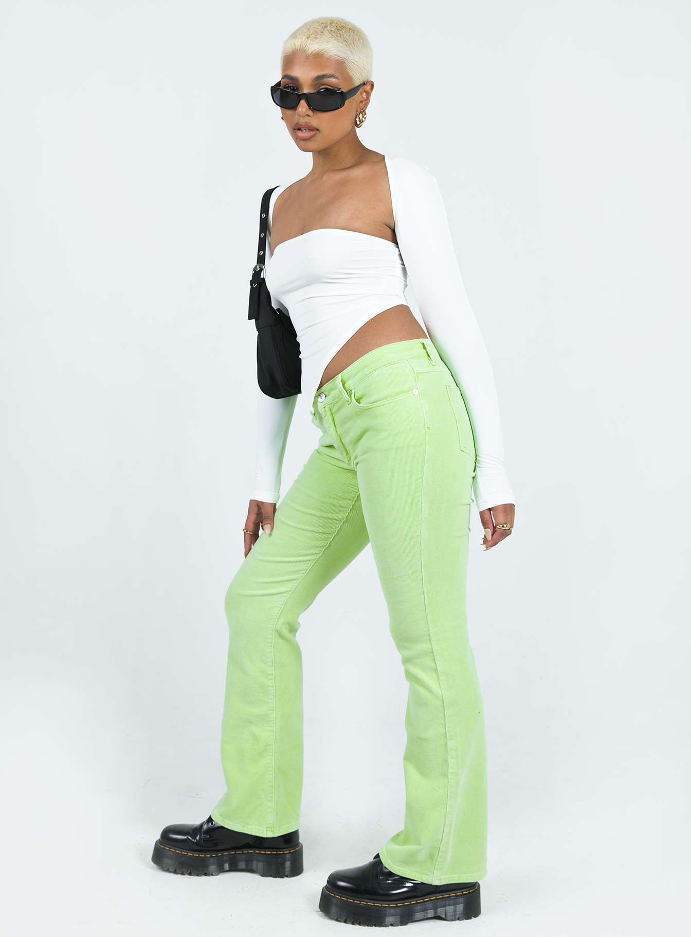 Pant Corduroy material Low-rise Belt looped waist Classic five-pocket design Flared leg