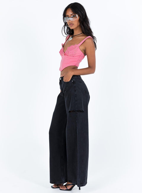 Jeans Black denim High rise Belt looped waist Zip and button fastening Classic five pocket design Branded patch at back Rip at thigh Wide leg