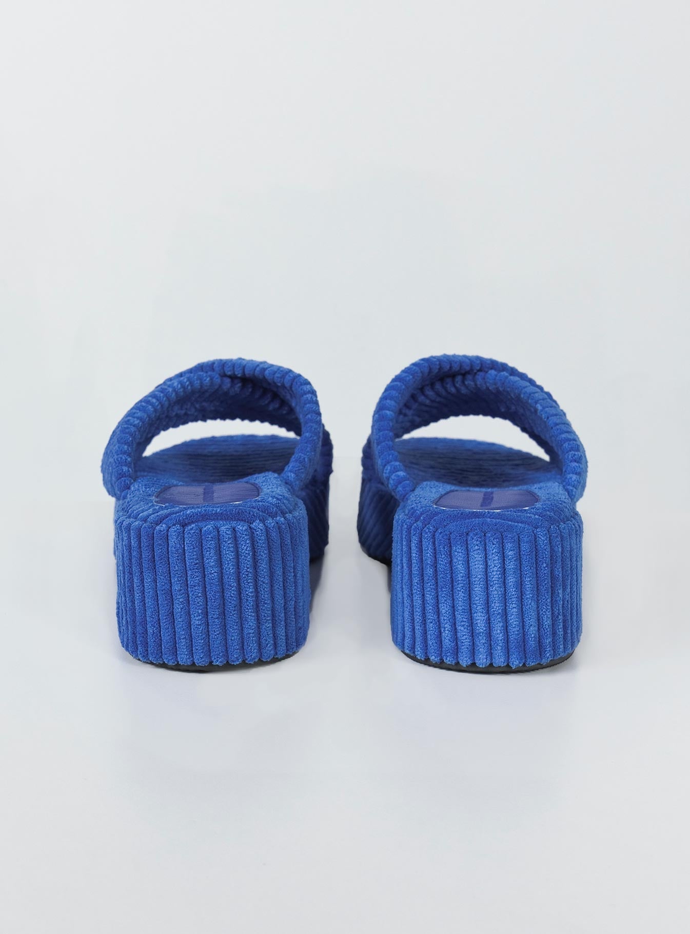 Sandals Cord material  Cross strap upper  Platform base  Rounded toe 