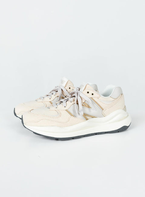 Sneakers  Faux suede & leather material  Lace-up style  Platform base Padded inner  Treaded sole 