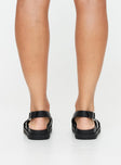 Faux leather sandals Rounded toe, strappy upper, buckle fastening at ankle