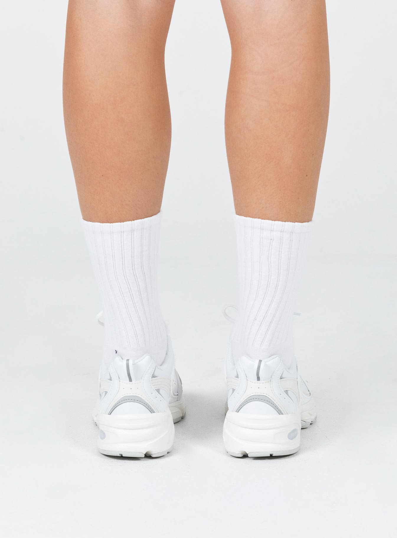 Sneakers Faux leather Lace-up fastening Pull tab at heel Treaded sole Padded footbed