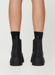 Faux suede boots Rounded toe, pull tab, treaded sole, elasticated gusset at side, padded footbed
