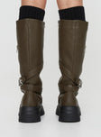 Knee-high faux leather boots Strappy upper, silver-toned buckles, round toe, treaded sole, contrast sole, zip fastening 