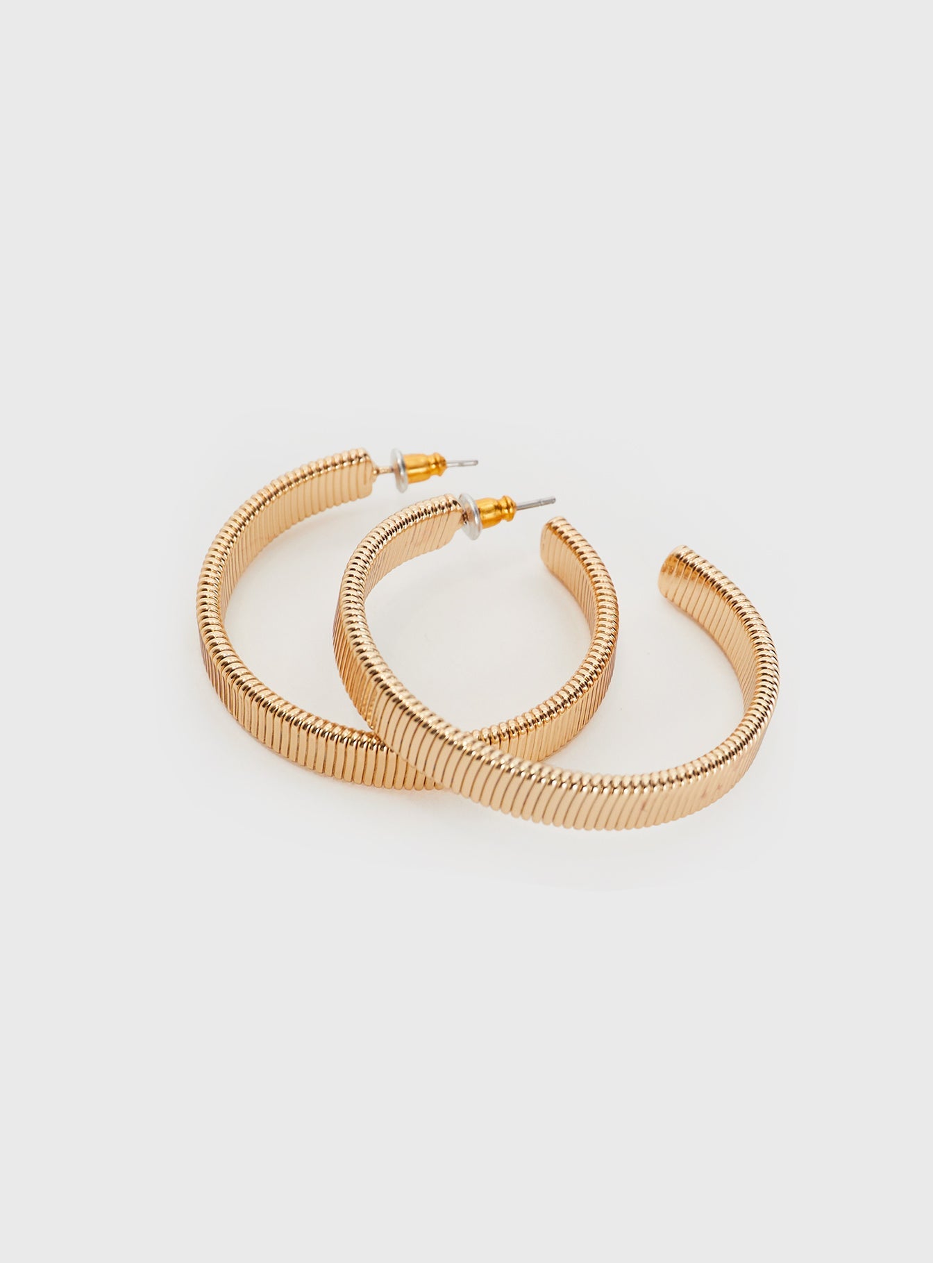 Gold-toned earrings Hoop style, stud fastening