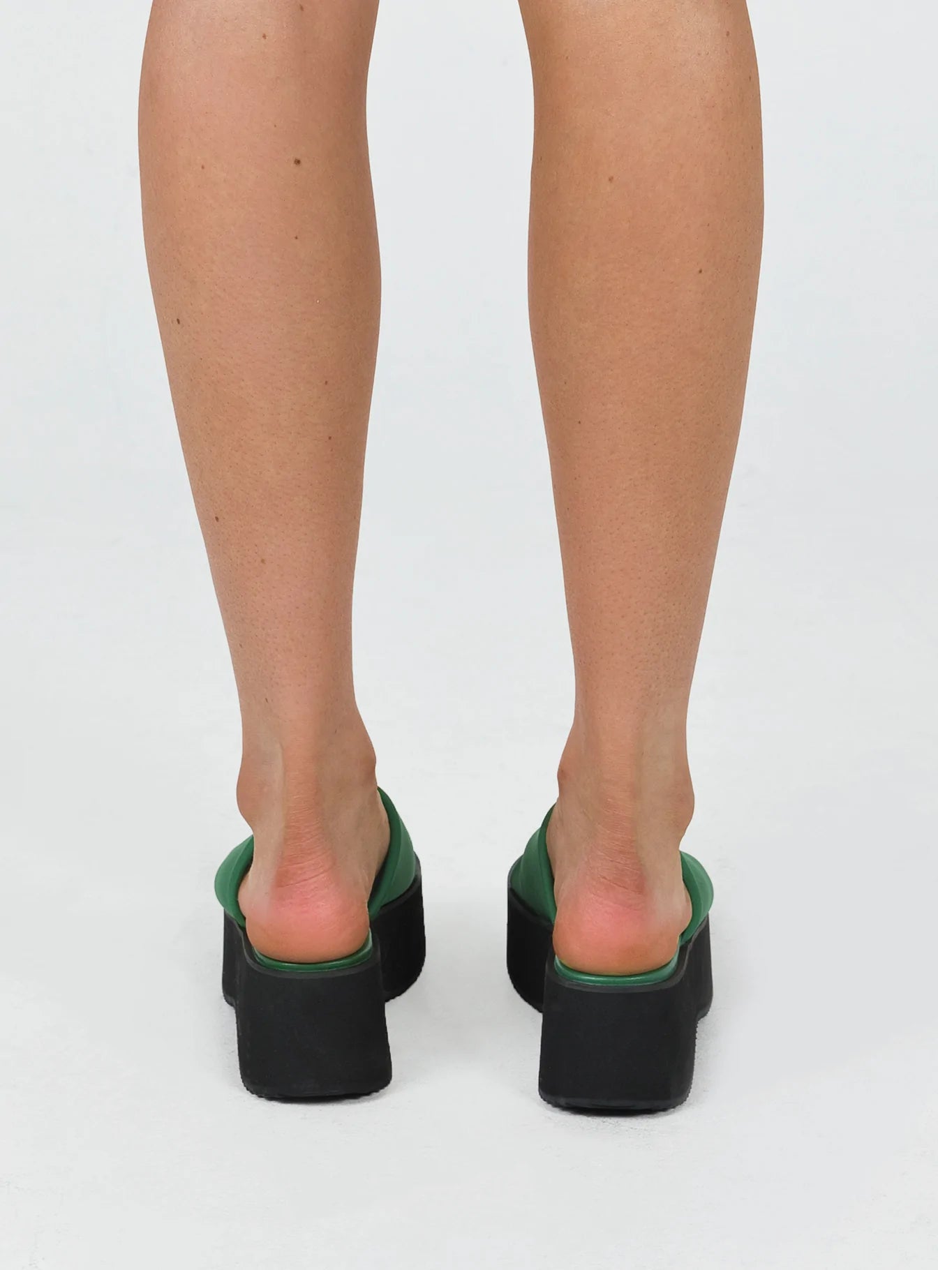 Sandals Single wide upper  Platform base  Rounded toe 