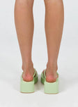 Sandals Flip-flop style upper Silver-toned buckle detail Platform base Square toe  Padded footbed 