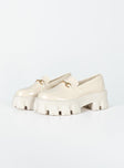 Loafers Faux patent leather  Platform base Treaded sole Gold-toned snaffle detail Rounded toe