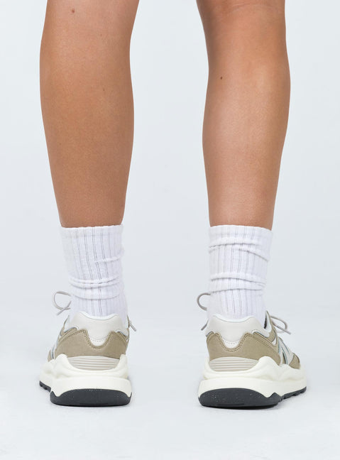 Sneakers  Lace-up style  Platform base Padded inner  Treaded sole 