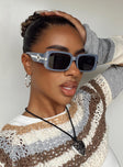 Sunglasses Oversized style Rectangle frame Gold-toned detail on arms Moulded nose bridge Smoke tinted lenses Lightweight