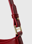 Shoulder bag Two adjustable shoulder straps, gold-toned hardware, zip fastening, flat base
