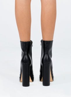 Black boots Faux leather material Zip fastening at side Square toe Platform base Block heel