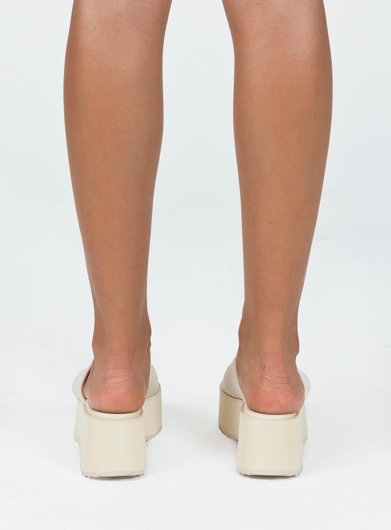 Sandals Single wide upper  Platform base  Rounded toe 