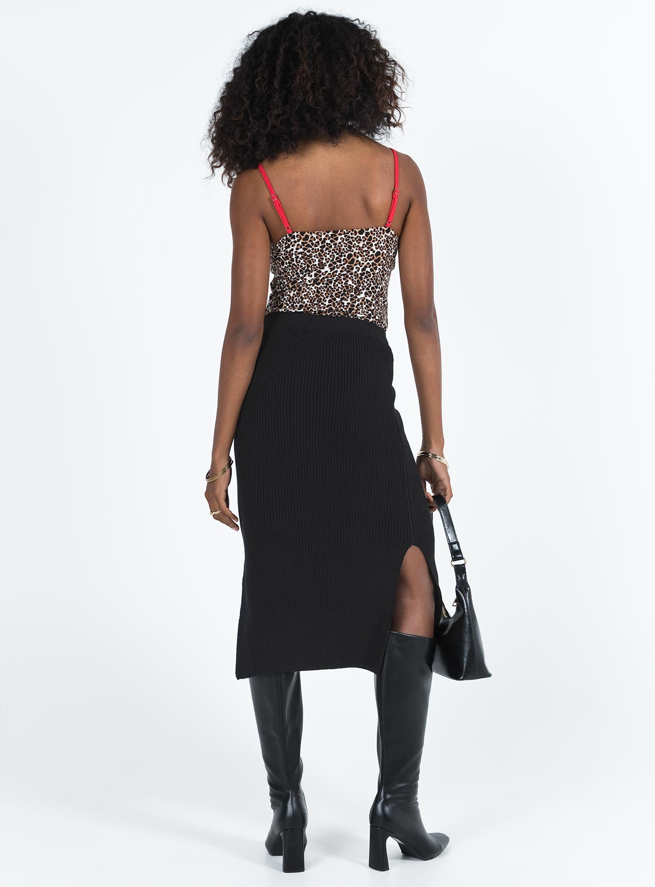 Midi skirt Knit material High waisted fit Side splits Slim fitting Elasticated waistband Unlined