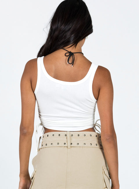 Crop top Scoop neckline Fixed straps Adjustable ruching at sides Slim fitting