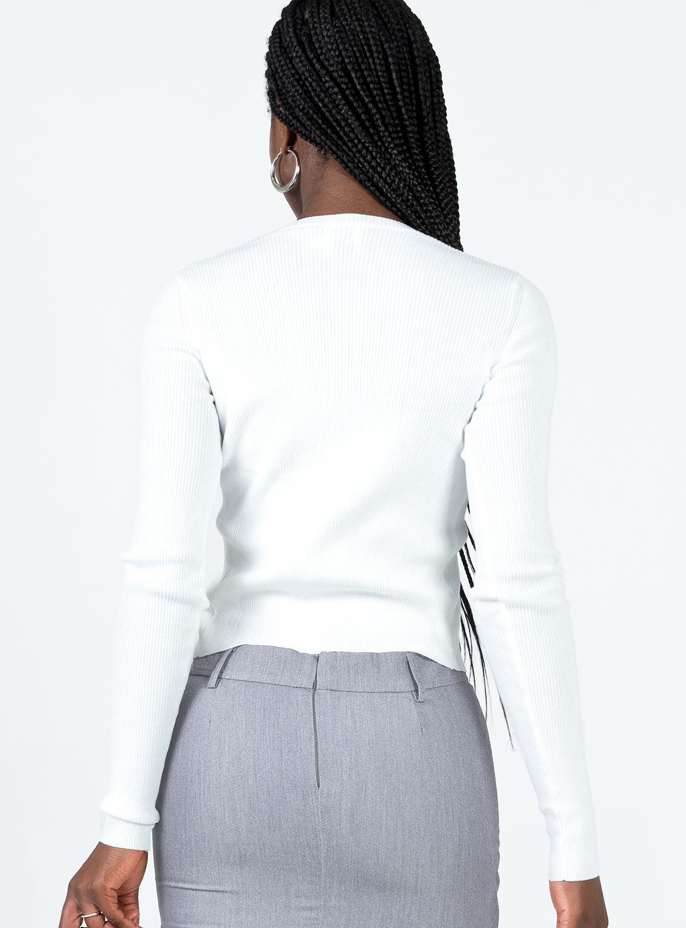 Long sleeve top Ribbed material Open front design Plunging neckline Fixed chain link at bust Good stretch