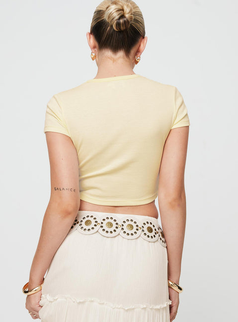    Graphic print baby tee, cap sleeves Slight stretch, unlined 