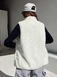Vest  100% recycled fibres  Faux fur material  Mock neck  Zip front fastening  Twin hip pockets  Non-stretch Fully lined 