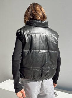 Puffer vest Main: 65% PU 35% polyester Lining: 100% polyester Faux leather material High neck Zip front fastening Elasticated waist Non stretch Fully lined