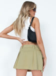 Beige mini skirt Hook & zip fastening  Belt looped waist  Removable & adjustable waist belt  Twin hip pockets Frayed hem 