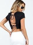 Crop top Adjustable cut-out at back with tie fastening Good stretch Unlined 