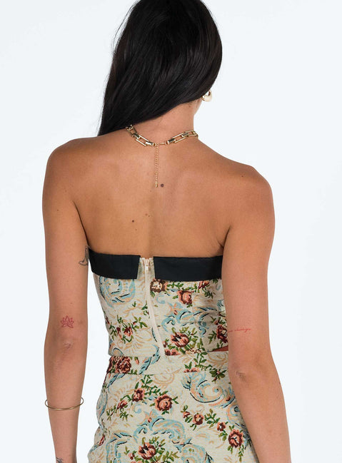 Strapless top Tapestry print Folded neckline Zip fastening at back Boning through front Pointed hem Good stretch Fully lined 