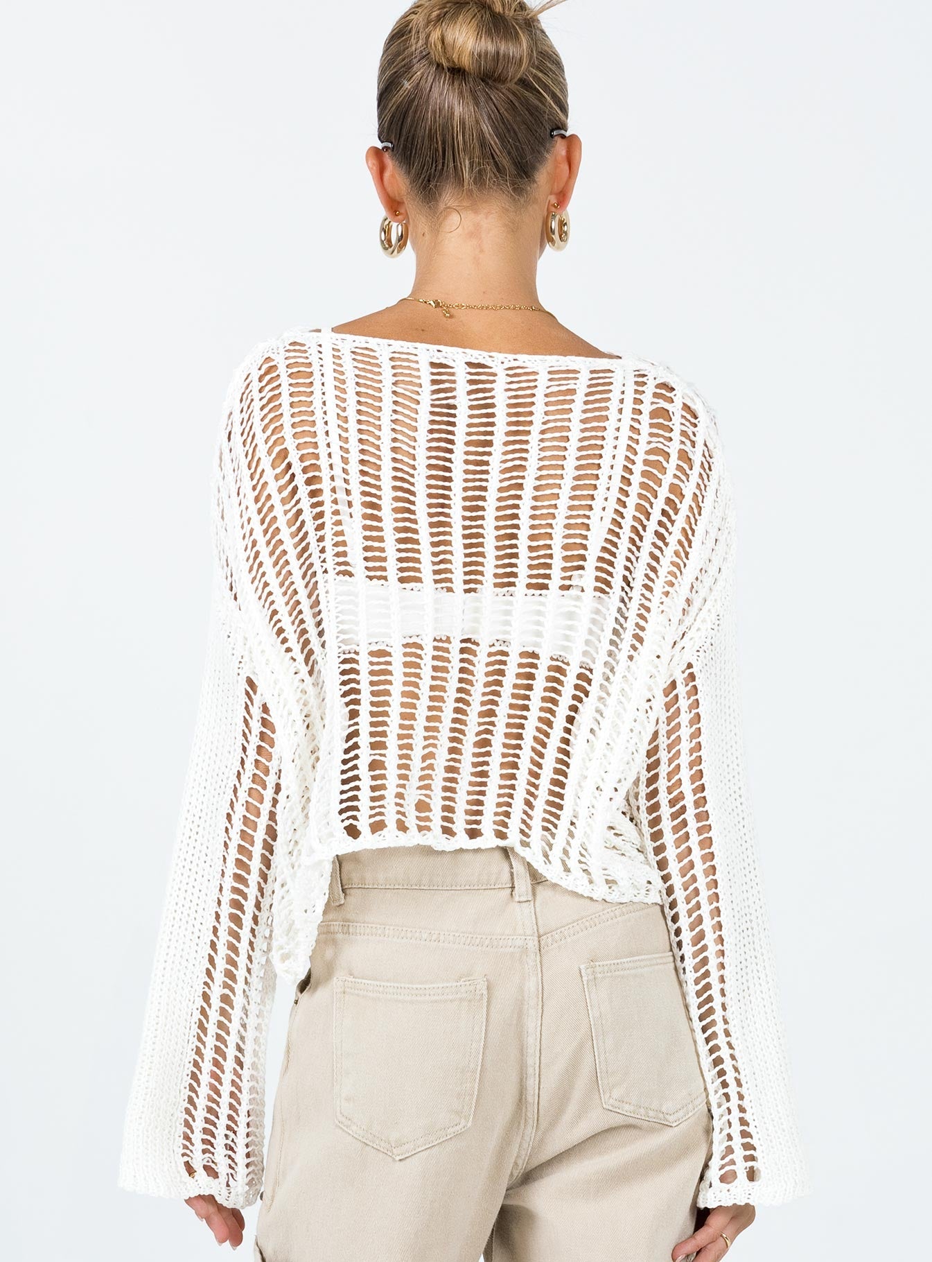 Sweater  Relaxed fit  100% polyester Mesh stitch crochet  Delicate material - wear with care  Wide neckline  Drop shoulder 