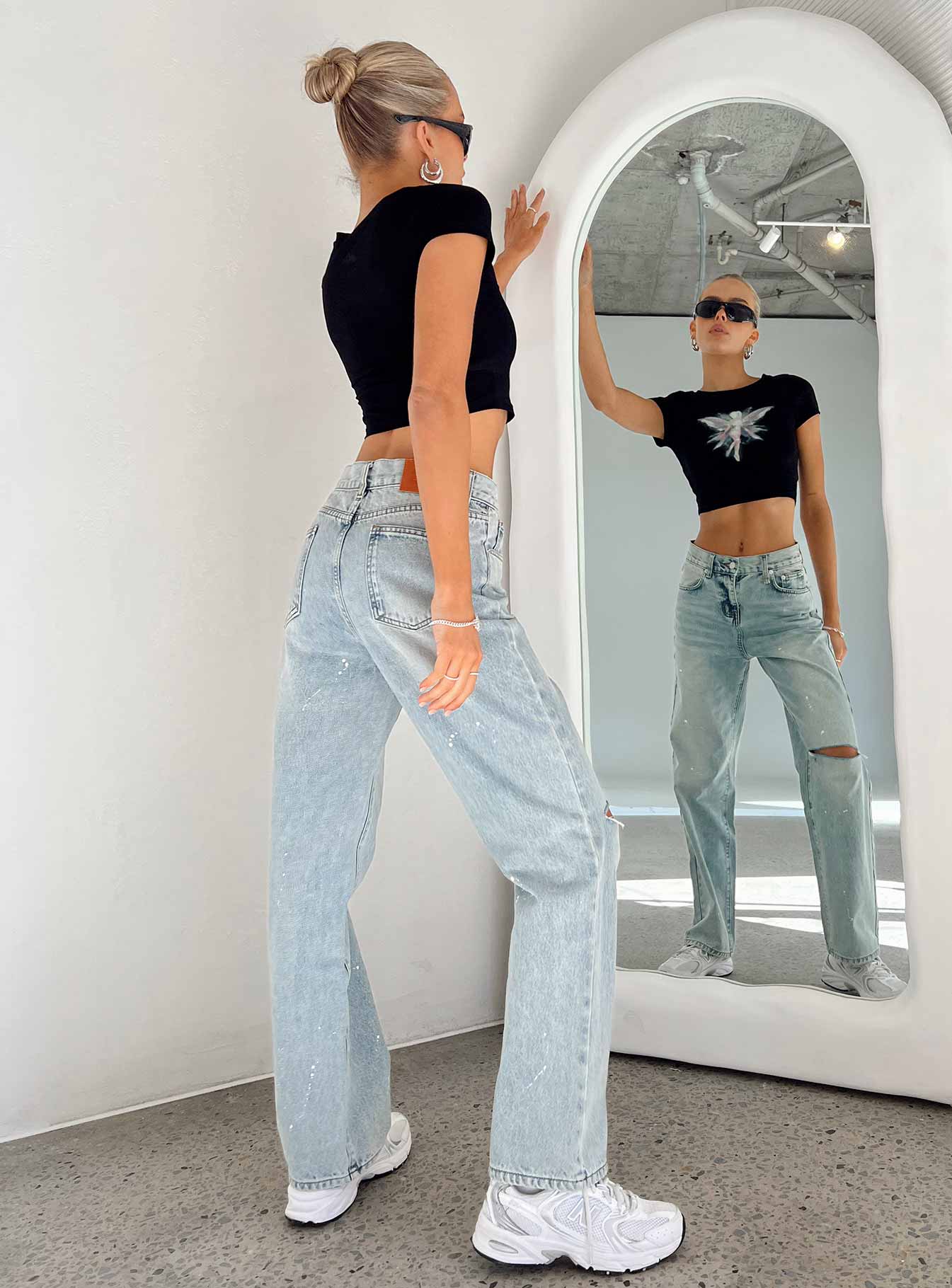 Jeans Light wash denim Paint splatter detail Belt looped waist Classic five-pocket design Zip & button fastening High waisted Ripped knees