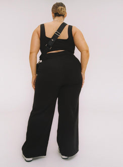 Black matching set Crop top Fixed straps Invisible zip fasting at side High waisted pants Wide relaxed leg Belt loops at waist Zip & button fastening