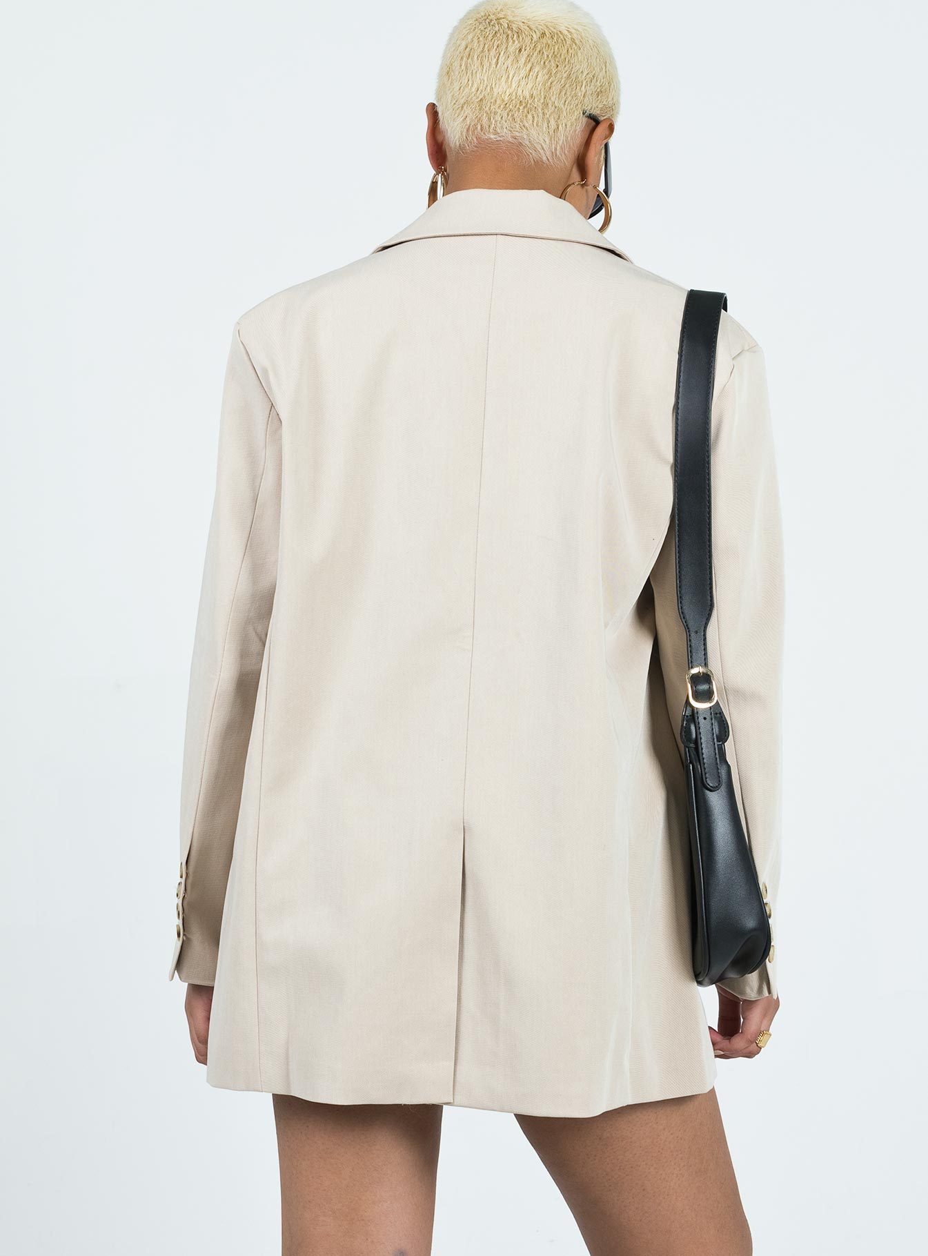 Oversized blazer Spare button included Lapel collar  Button front fastening  Twin hip pockets  Faux chest pocket  Four-button cuffs  Satin lined 