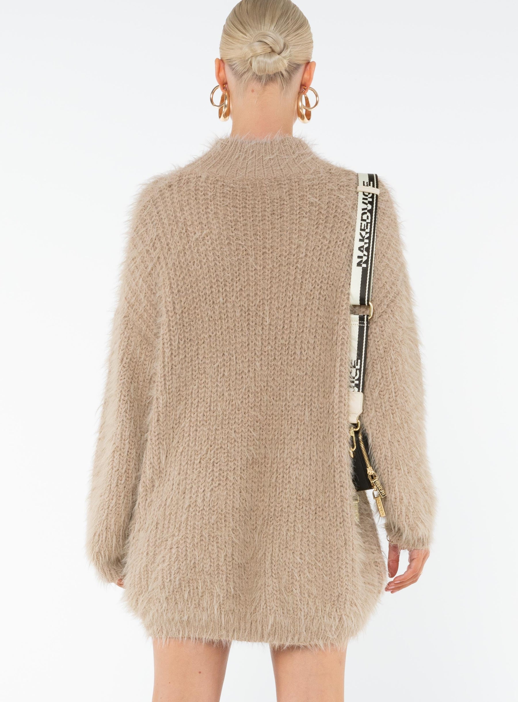 Fluffy knit sweater Drop shoulder Good stretch, unlined 