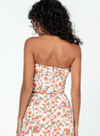Strapless top Floral print  Inner silicone strip at bust  Zip fastening at back  Curved Hem