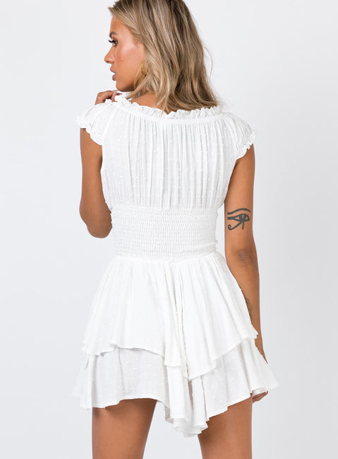 Playsuit Can be worn on or off the shoulder Soft textured material Shirred waistband Ruffle detailing Elasticated neck and sleeves Fully lined