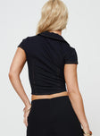 Dark wash denim vest top V-neckline, zip fastening at front, faux front pocket