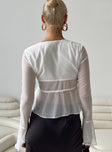 Long sleeve top Sheer material V neckline Lace trim Twin tie fastening at bust