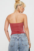Strapless sparkly top Thin elasticated band at bust, asymmetric hem, adjustable ruching at side with tie fastening