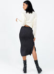 Midi skirt Soft knit material  Elasticated waistband  Side slits 