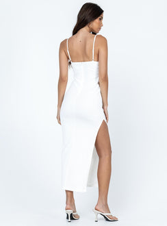 Maxi dress Ribbed material  Adjustable shoulder straps  Cut out sides  Invisible zip fastening at back  High side slit 