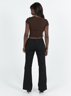 Black pants Low rise Belt looped waist Twin hip pockets Slim leg  Slightly flared cuff
