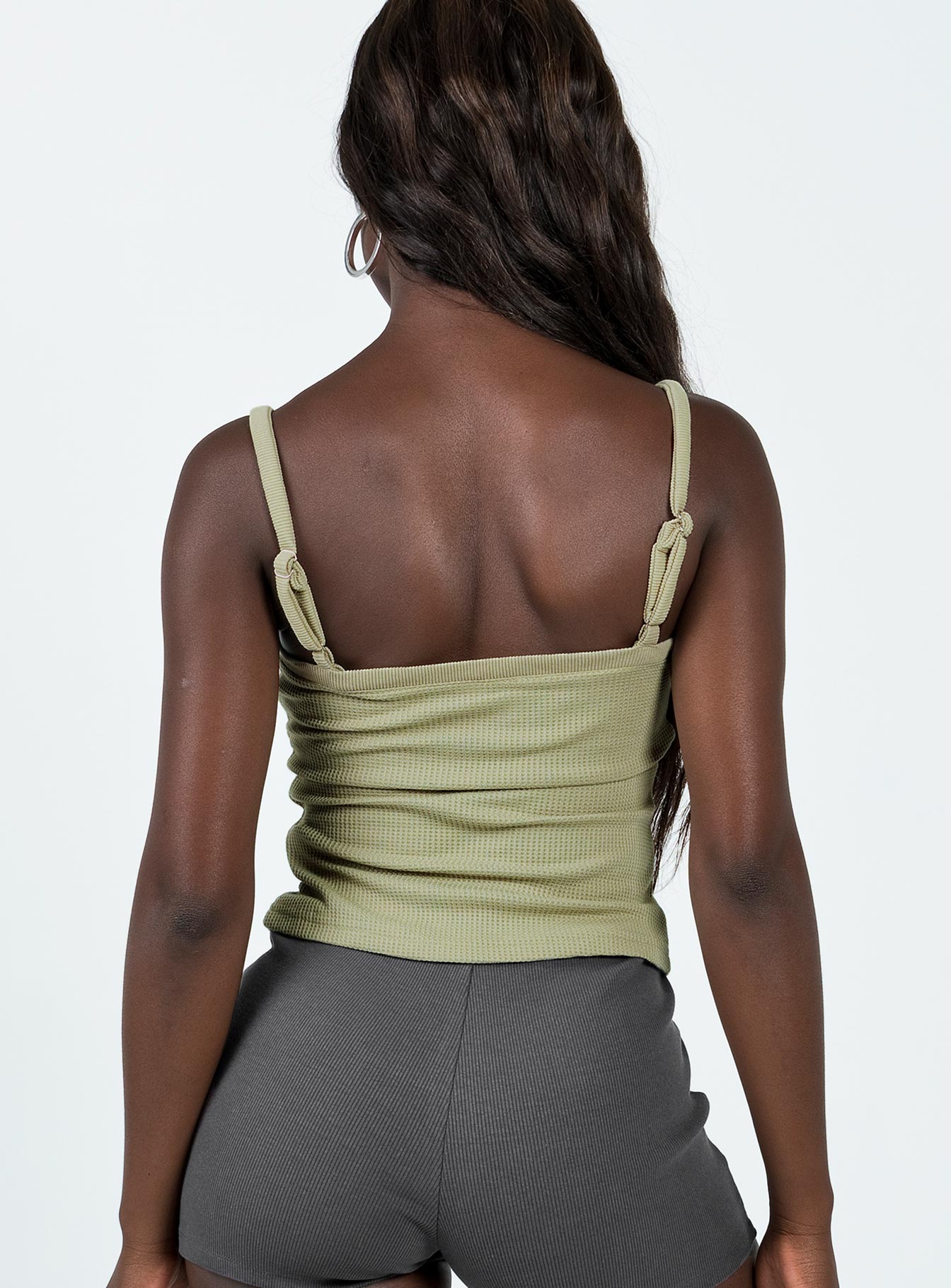 Tank top Waffle knit material Adjustable shoulder straps   Good Stretch Partially lined  