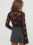Lace material, high neckline, flared sleeve, high cut leg, g string bottom, press clip fastening at base