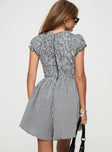Black and white Gingham romper Puff sleeve, deep v neckline, shirred material, invisible zip fastening down back