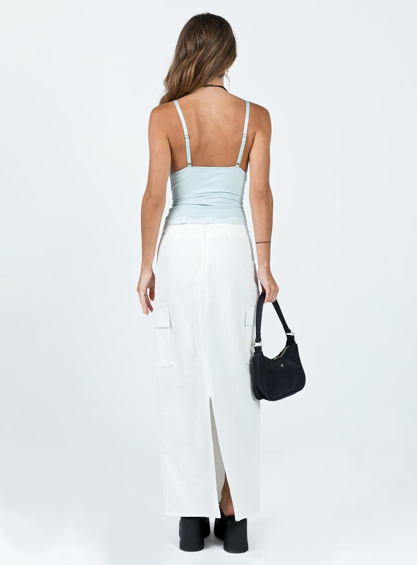 Maxi skirt Invisible zip fastening at back  Drawstring at waist Cargo style leg pockets Slit at back