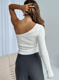 One shoulder top Ribbed knit material  Raw hem  Slightly sheer Good stretch 