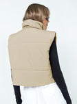 Cream puffer vest High neck Zip front fastening  Faux chest pocket 