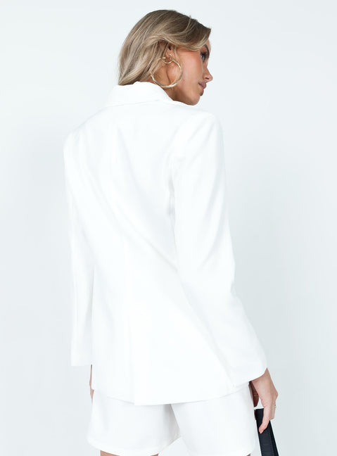 White blazer 100% polyester Lapel collar  Button front fastening  Faux pockets  Padded shoulders 