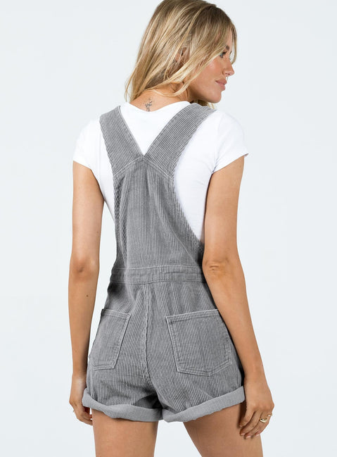 Overalls Corduroy material Adjustable buckle straps Button fastening at sides Large chest pocket Classic four pockets  Gold-toned hardware  Fixed rolled hem