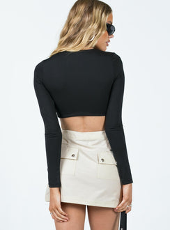 Mini skirt Windbreaker material Drawstring waist Invisible zip fastening at side Twin hip pockets Cargo style back pockets